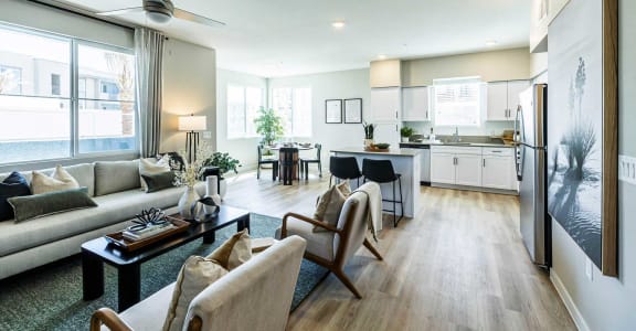 a living room and kitchen in an apartment at BASE APARTMENT HOMES, LAS VEGAS, NV