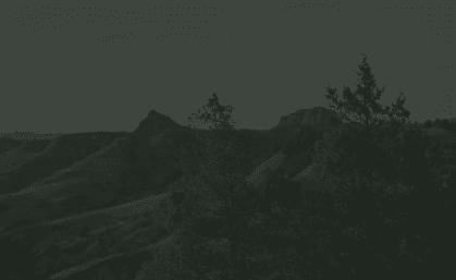 View of Mountains and Trees with Dark Overlay