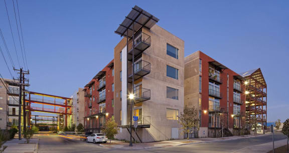 a rendering of the building at night with a street in front of it  at 1221 Broadway Lofts, San Antonio, 78215