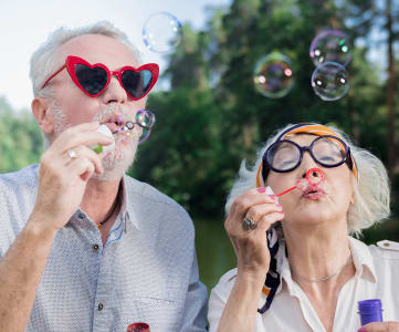 Seniors blowing bubbles | Vintage at Bellingham in Bellingham, WA
