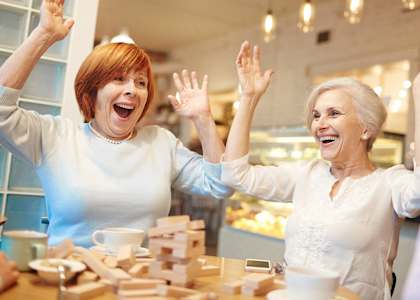 Seniors Playing Jenga at VINTAGE AT NAPA, California
