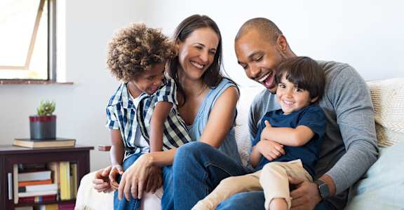 Family on Couch at GATEWAY BY VINTAGE, Washington