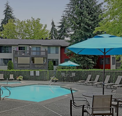 Yarrowood Highlands Exterior and Pool with Lounge Chairs