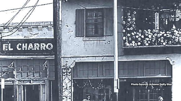 a black and white photo of the side of a building