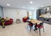 Thumbnail 8 of 8 - a dining room and kitchen with a table and chairs