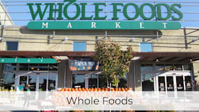 A Whole Foods Market storefront with a sign for pumpkin pies.at Axle, Washington