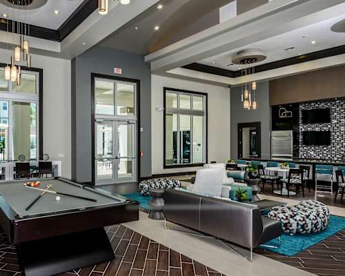 Clubhouse with Billiards at Epic at Gateway Luxury Apartments in Pinellas Park FL