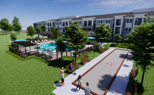 A modern apartment complex with balconies and a pedestrian walkway.