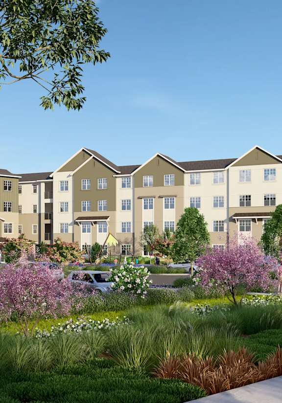 A large building with a parking lot in front of it.at Terracina at Winding Creek, Roseville