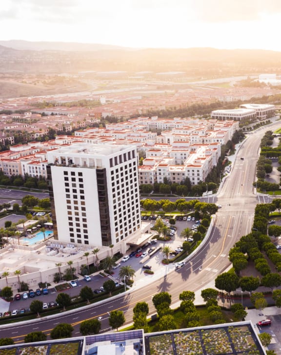 an aerial view of a city with tall buildings