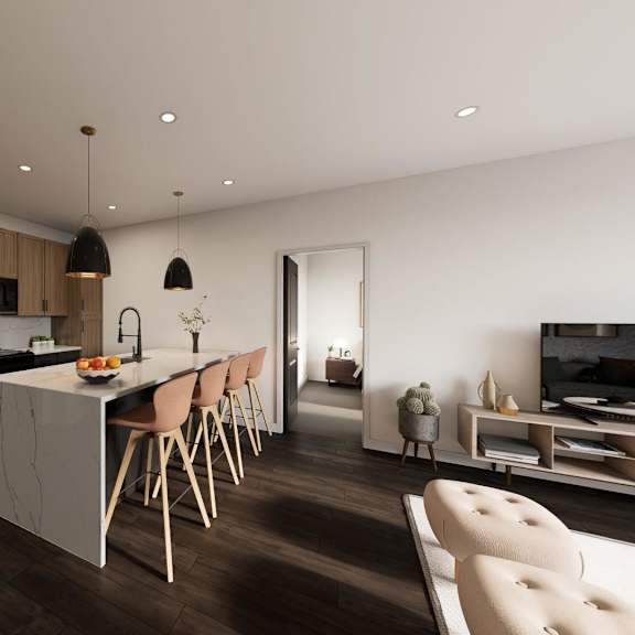 the kitchen is open to the living room and dining room