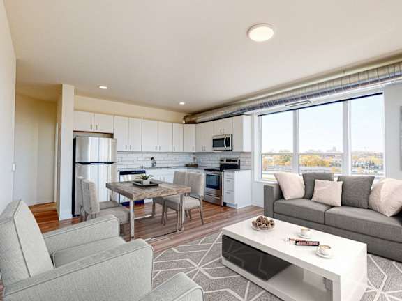A modern living room at The Bessemer at Seward Commons Apartments, Minneapolis