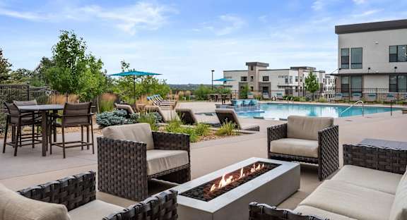 Gateway Arvada Ridge Outdoor Courtyard with Pool, Fireplace, and Seating Areas