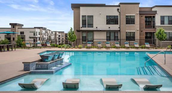 Gateway Arvada Ridge Outdoor Courtyard with Pool, Fireplace, and Seating Areas