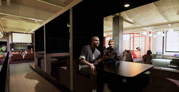 A group of people are sitting in a modern room. at University Commons in Pittsburgh, PA