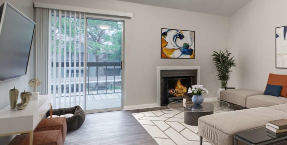 a living room with a fireplace and a sliding glass door