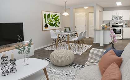 a living room and dining room with a table and chairs
