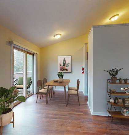 a dining room with a table and chairs