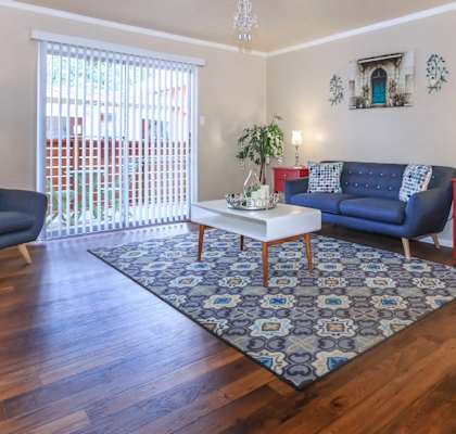 a living room with a couch and a coffee table