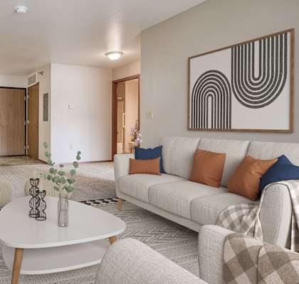 a living room with a couch and a table