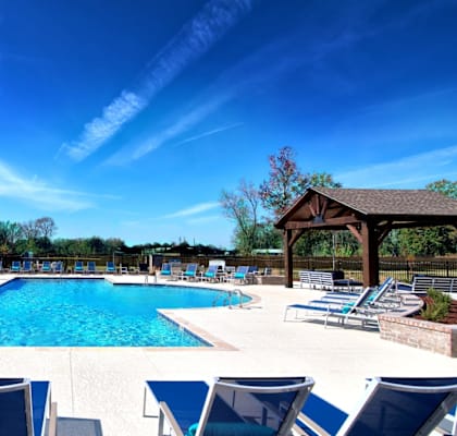 A large outdoor swimming pool at Silver Oaks Apartments, Gonzales, LA 70737