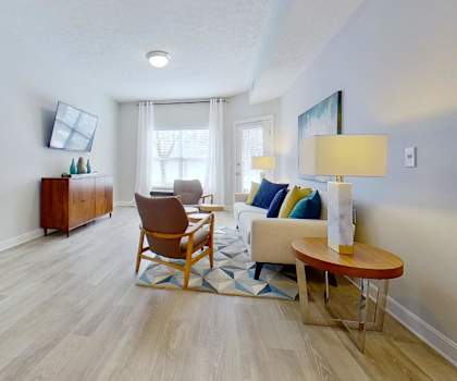 a living room with a couch and a table