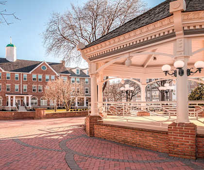 a gazebo in front of a large brick building at Wormans Mill, Frederick, MD, 21701
