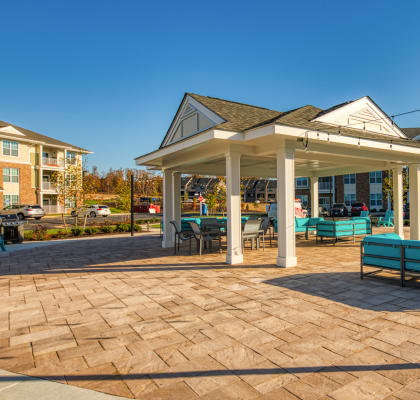 a gazebo and benches at the enclave at woodbridge apartments in sugar land at Sapphire at Centerpointe in Midlothian, VA 23114