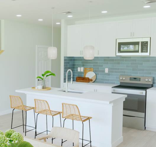 A kitchen with a white counter and bar stools.