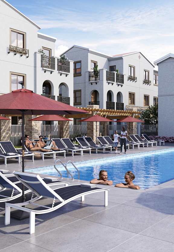 a swimming pool at a hotel with people in it