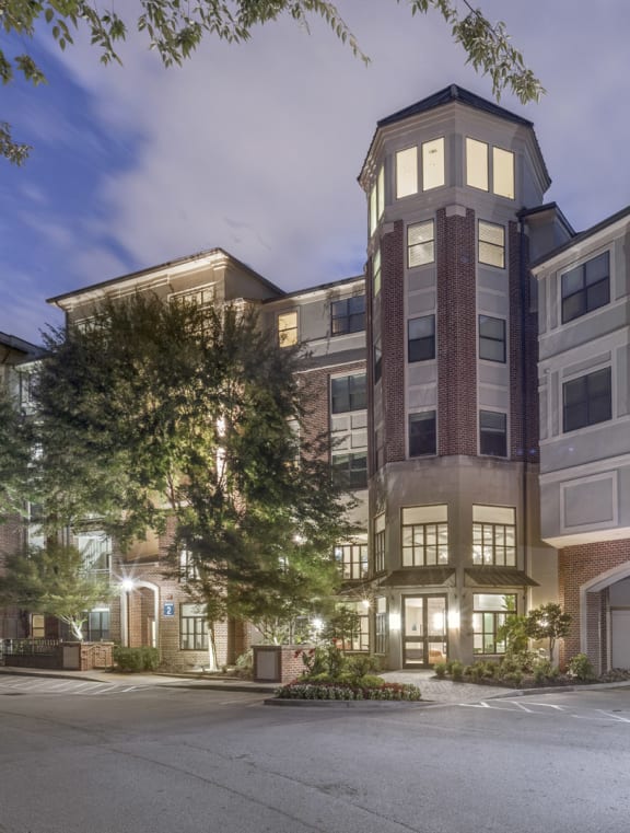 a street view of an apartment building at night at The Hendrix, Atlanta, GA, 30329