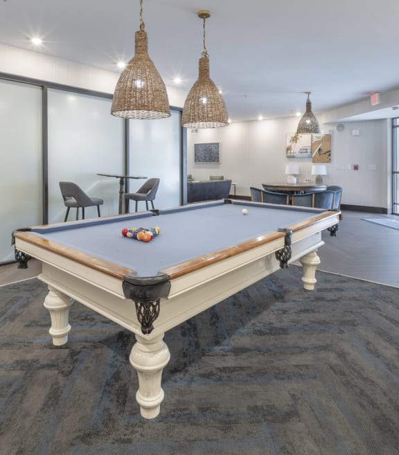 clubhouse with pool table at the preserve at great pond apartments in windsor tx at The Haven, Atlanta Georgia