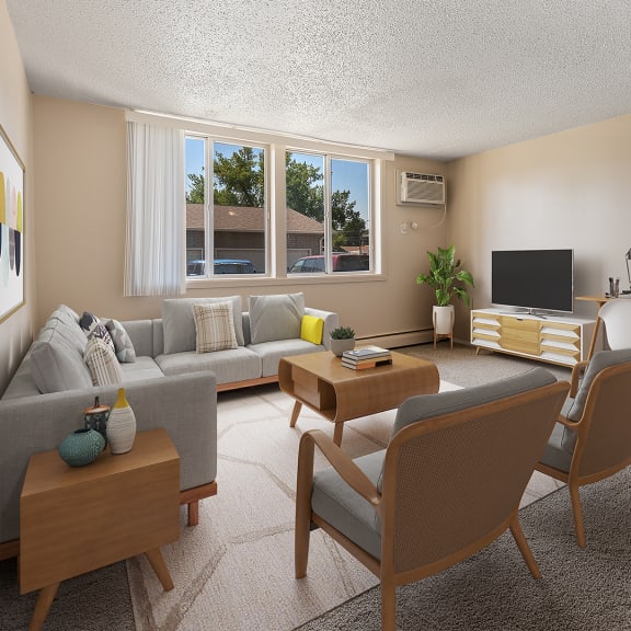 a living room with a couch and a table and chairs