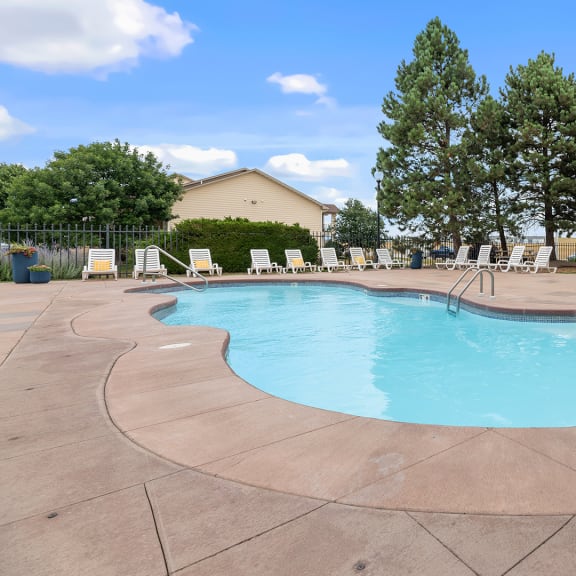 our resort style pool is next to our building and has chairs around it