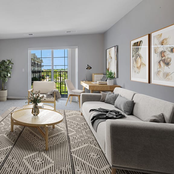 an open living room with a couch and a table