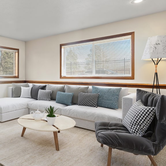 a living room with a couch and a coffee table