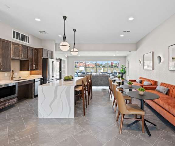 a kitchen and living room with a table and chairs at Chapel Ridge of Gallatin, Tennessee, 37066