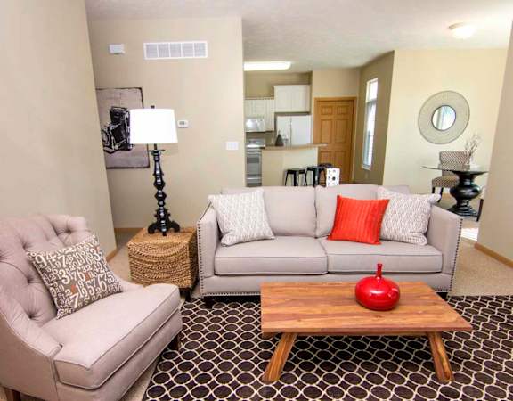a living room with two couches and a coffee table