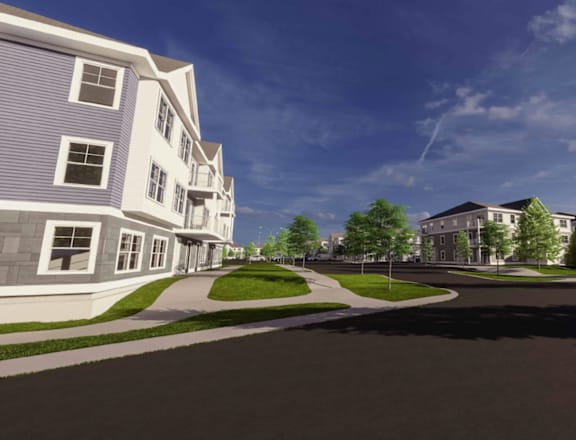 A street view of a residential area with houses and a car parked on the side.