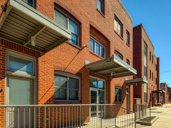 a brick building with a gate in front of it at North Market South Carroll, Frederick Maryland