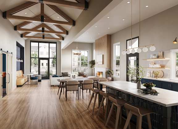 A modern kitchen with wooden floors and a large island.