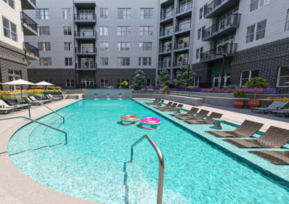 Stunning Pool View with Shaded Lounge Chairs and In-Water Tanning  Leadges at Link Apartments® Fitz, Aurora