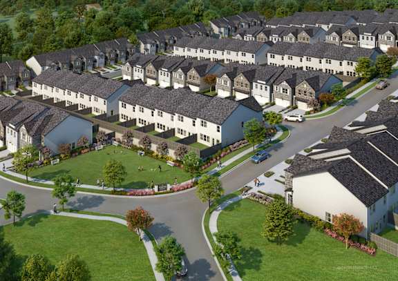 A large, well-maintained housing development with a variety of houses and landscaping.