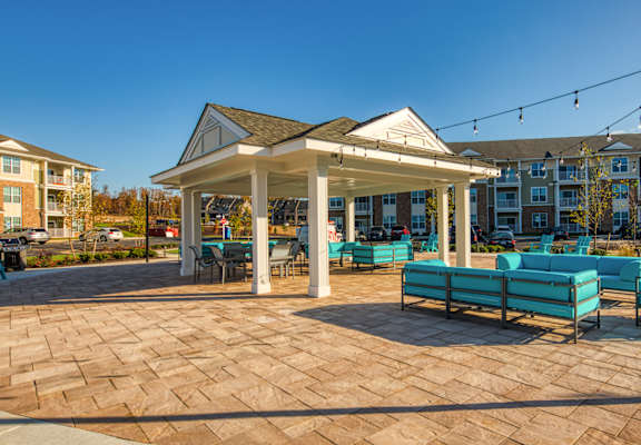 a gazebo and benches at the enclave at woodbridge apartments in sugar land at Sapphire at Centerpointe in Midlothian, VA 23114