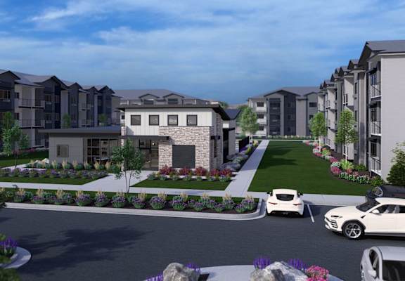 a rendering of an apartment complex with cars parked in front of it