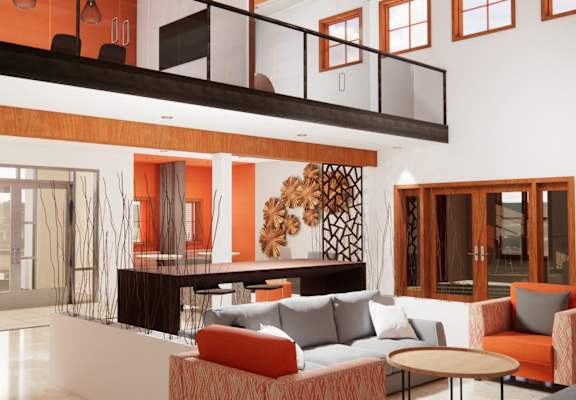 A living room with a couch, chairs, and a table.