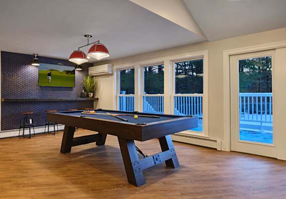 Game Room With Billiards And Shuffleboard at Heritage at the River, Manchester, 03102