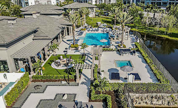 an aerial view of the pool and patio area at the resort