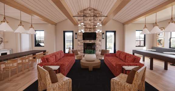 a rendering of a living room with furniture and a fireplace at Sandhill Parkway Townhomes Apartments, East Bethel, Minnesota