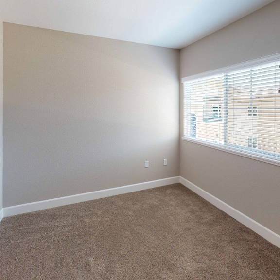 an empty bedroom with a large window and a sink at Edgewater, Pittsburg, CA 94565